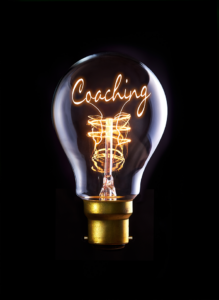 Ampoule avec l'inscription "Coaching" pour symboliser l'accompagnement en Fist-Fucking et Sexualités Alternatives